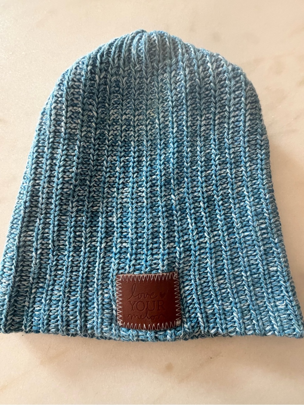 Love Your Melon Light Blue Ribbed Knit Beanie with Brown Patch